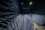 A dark room with jagged walls, floor and ceiling