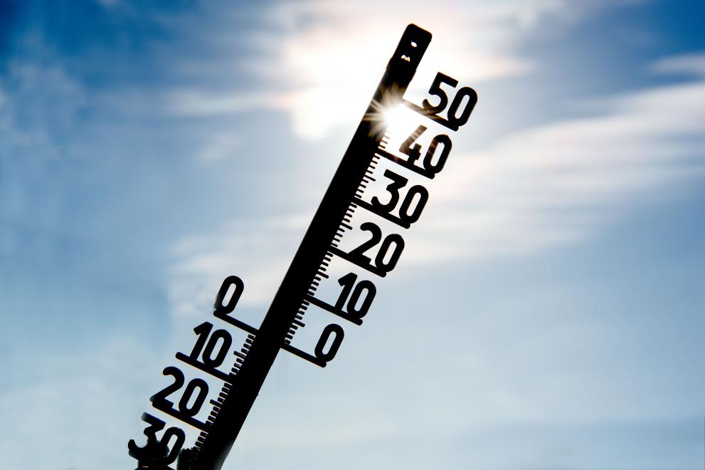 Thermometer in front of the sun